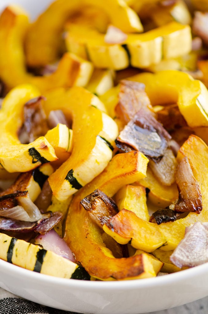 Roasted Delicata Squash and onions in bowl