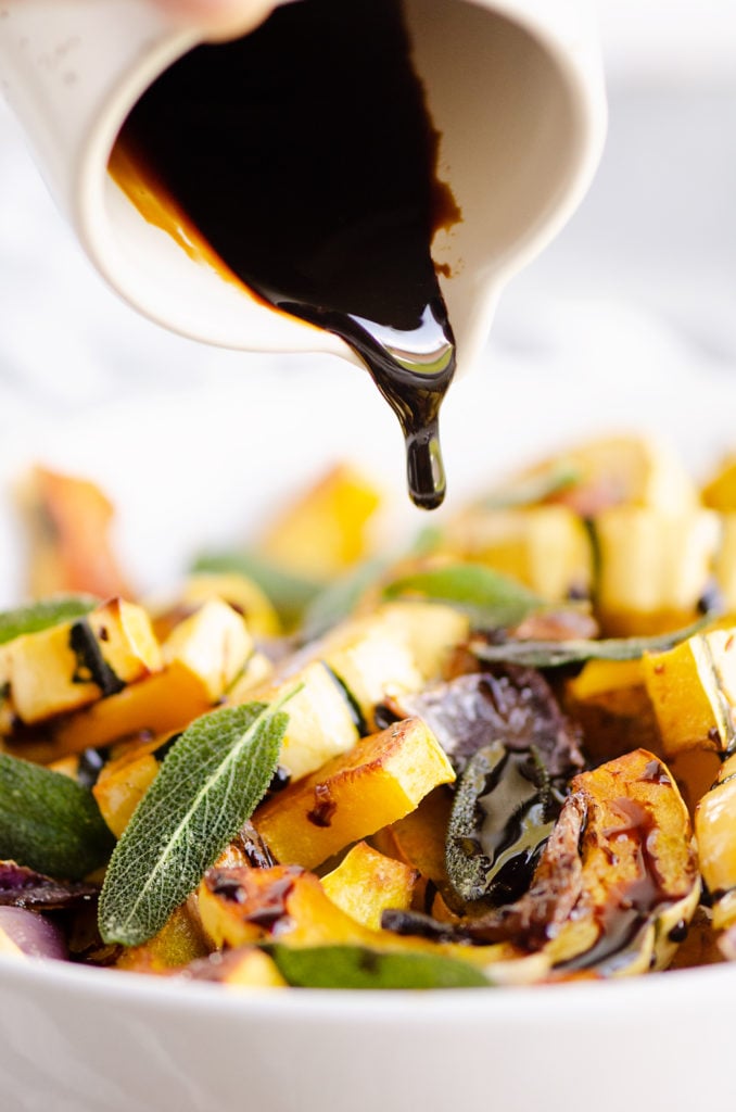 Crispy Sage Roasted Delicata Squash drizzled with balsamic glaze