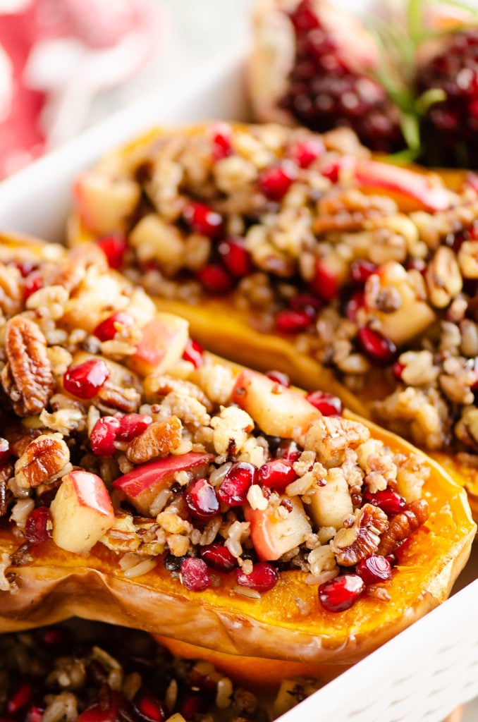 Stuffed Butternut Squash with Apples, Pomegranates & Grains in baking pan