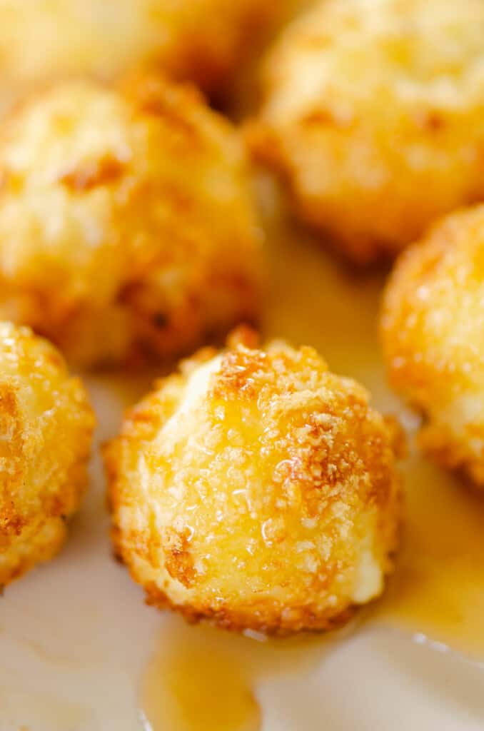 sur goat cheese balls drizzled in honey