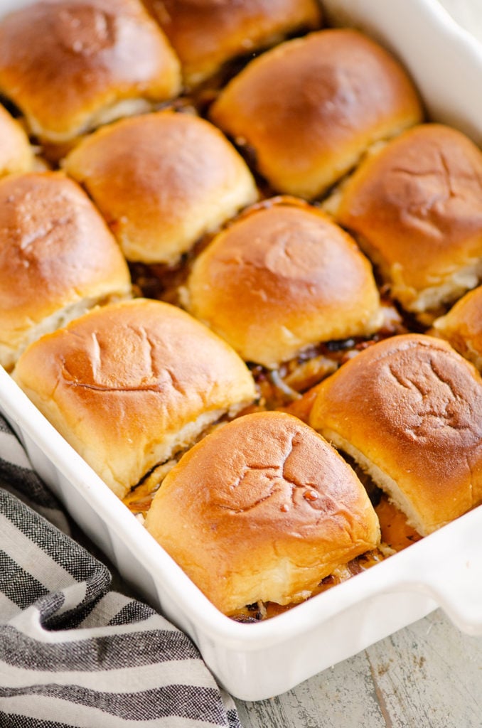 Cheesy Turkey Baked Sliders in white pan