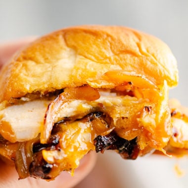 holding Cheesy Turkey Slider in hand