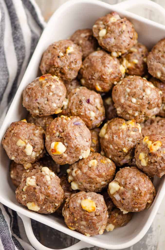 Greek meatballs in white baking dish