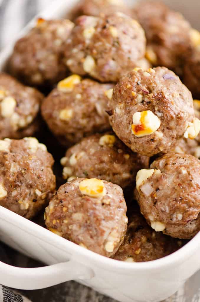 Greek meatballs in white baking dish