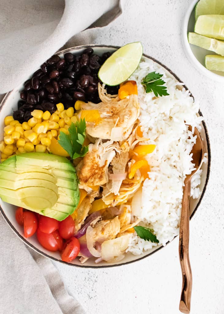 Instant pot chicken fajitas in bowl with spoon