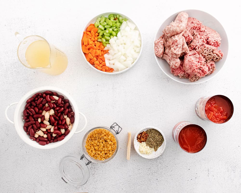 pasta e fagioli soup ingredients on white table