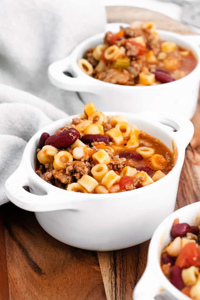 white bowls full of pasta e fagioli soup