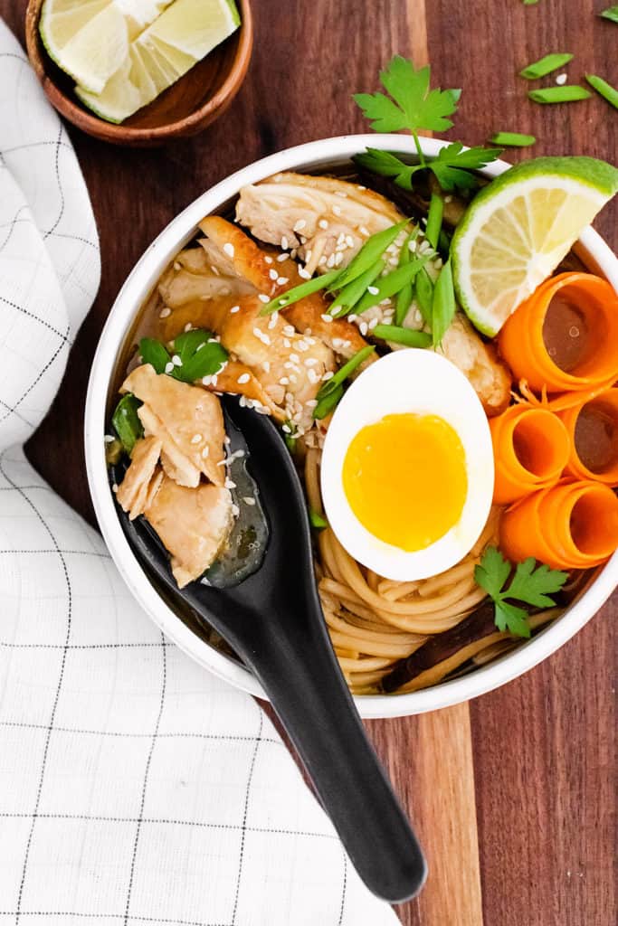 Chicken Ramen with Sweet Chili Oil with spoon in bowl