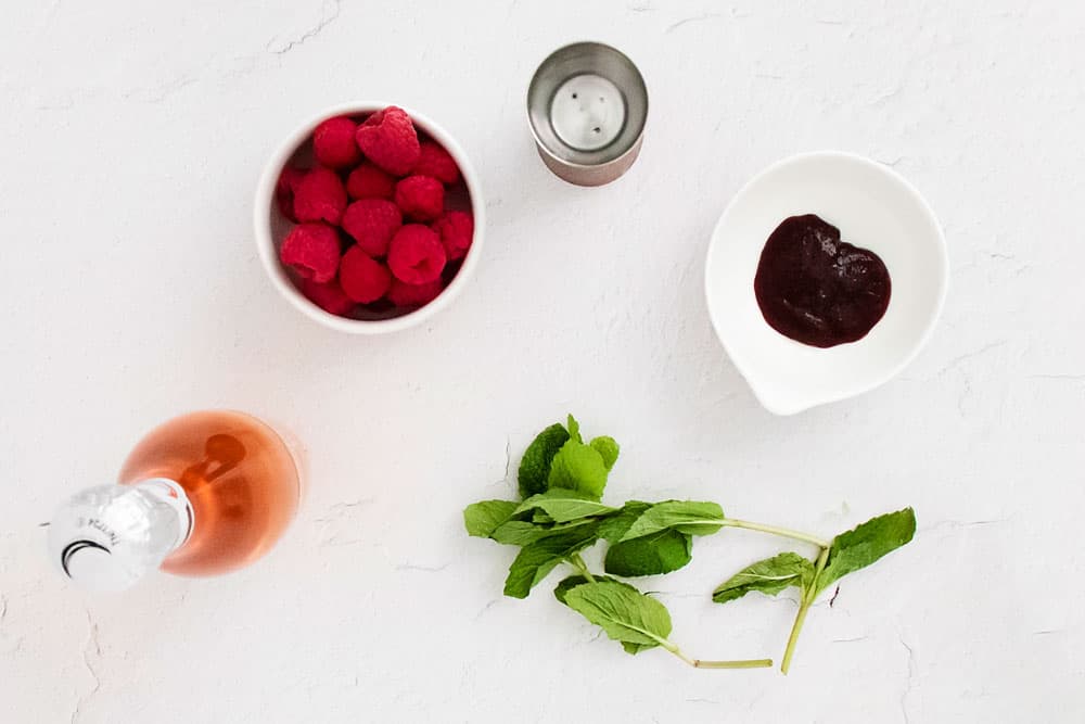 Raspberry Rosé Spritzer on white table