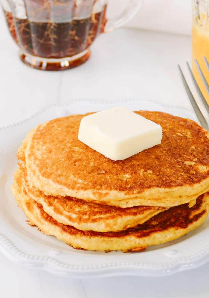 cornmeal pancakes topped with butter