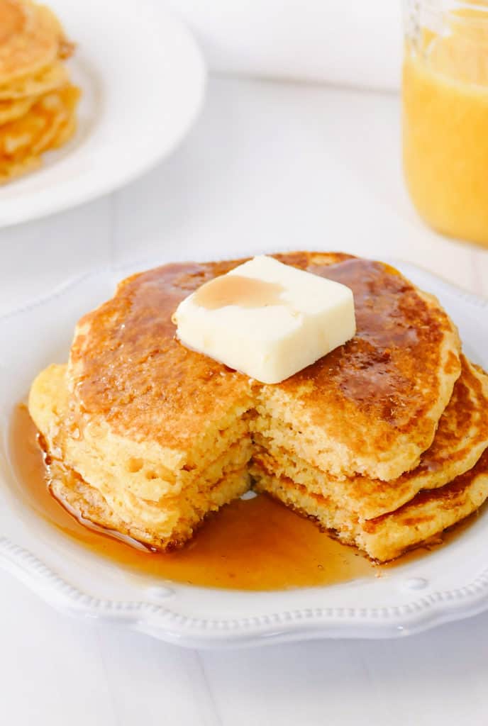 cornmeal pancakes with bite taken out