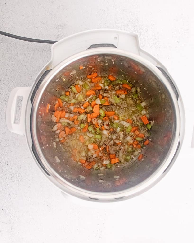 ground beef and vegetables in Instant Pot pressure cooker
