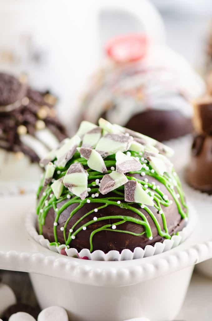 mint hot cocoa bomb in muffin tin