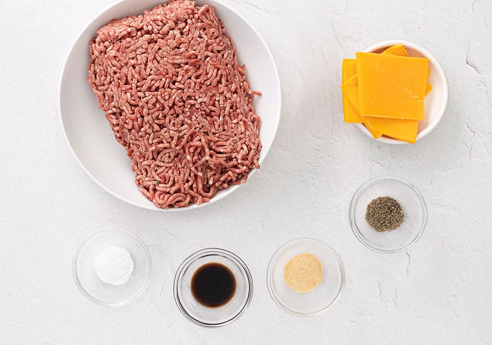 air fryer cheeseburger ingredients on white table