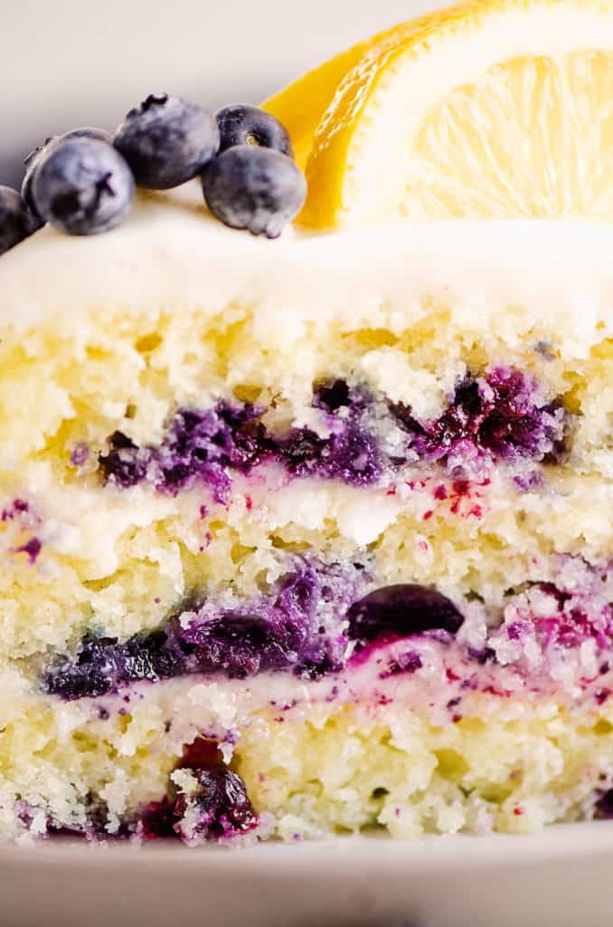 layeres of blueberry cake with buttercream