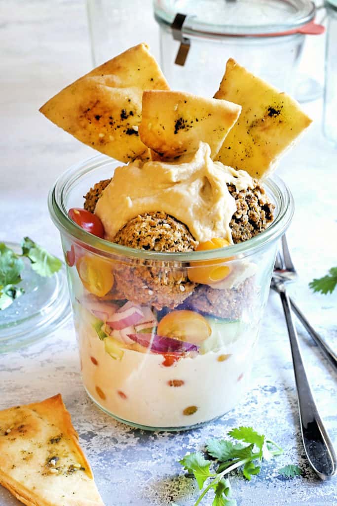 falafel salad in a jar with toasted pitas