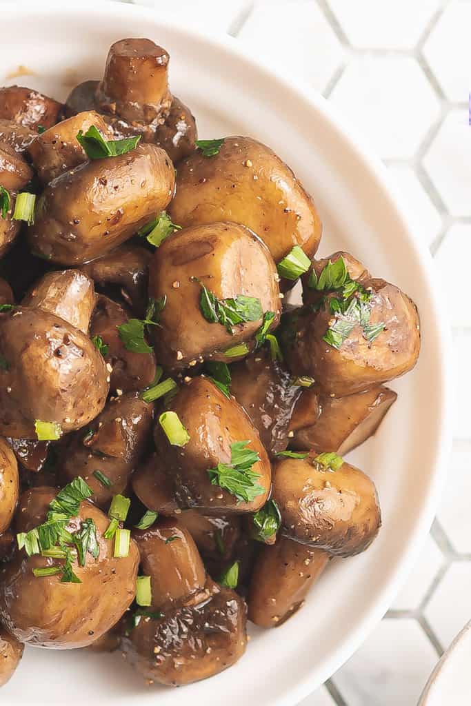 fresh mushrooms topped with garlic and parsley