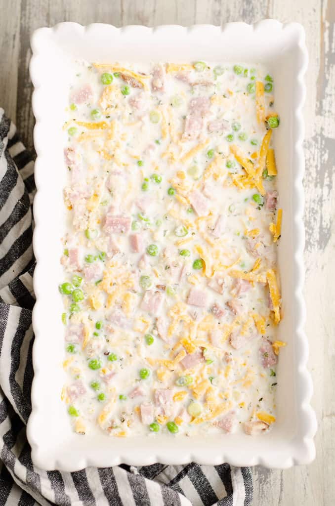 ham and cheese casserole mixed in baking dish before baking