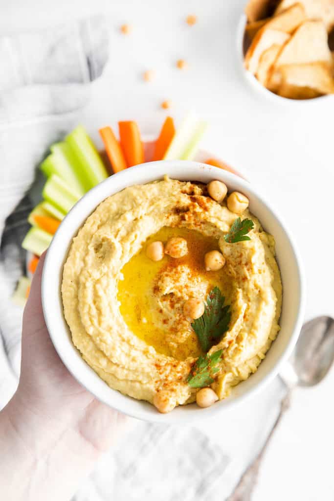 creamy classic hummus topped with olive oil and chickpeas