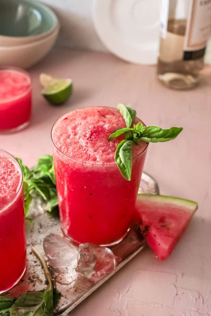 watermelon wine slushie on table wtih wedge o watermelon