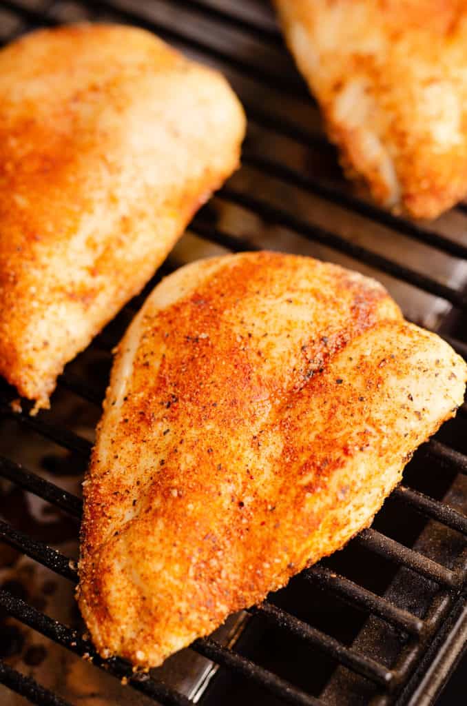 chicken breast on smoker grill