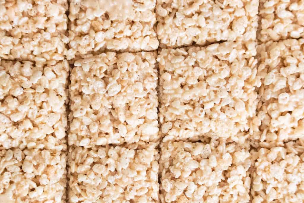 brown butter rice krispie treats cut into squares in the pan