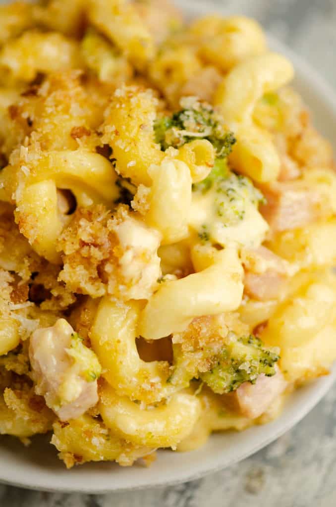 mac and cheese with broccoli and ham piled high on plate