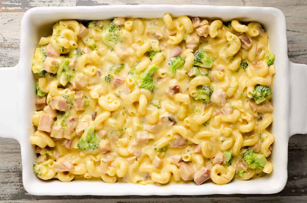 mac and cheese with broccoli and ham in white casserole