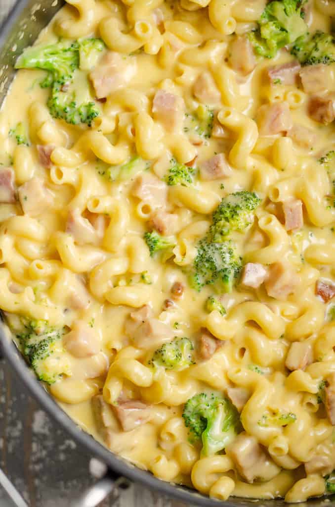 mac and cheese with broccoli and ham in pan