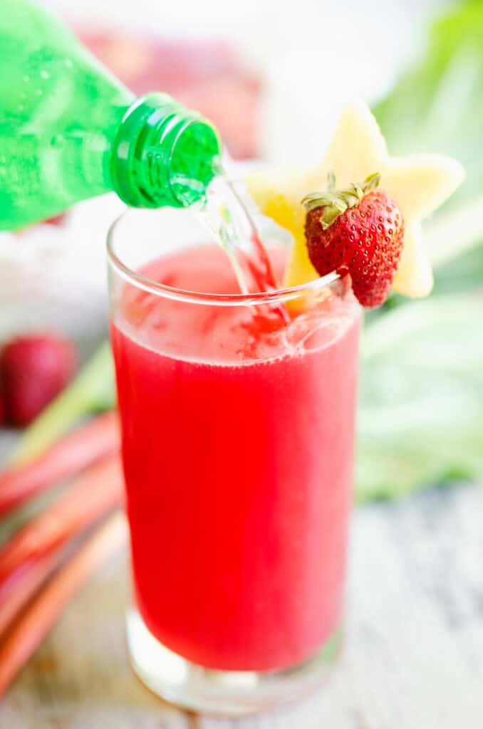 lemon lime soda poured over strawberry rhubarb juice