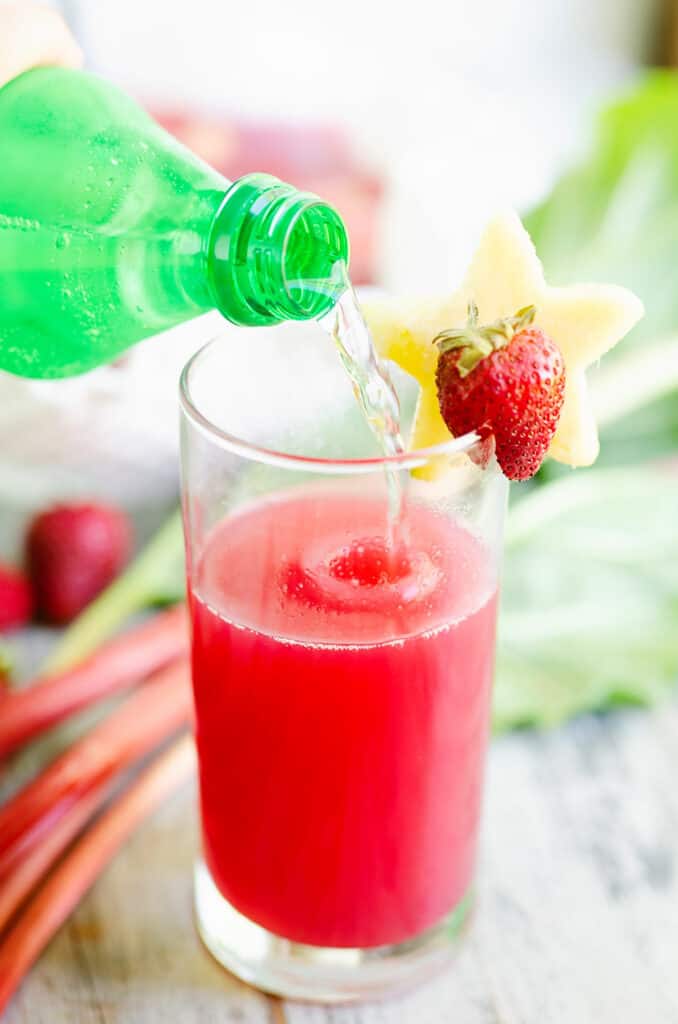 lemon lime soda poured over strawberry rhubarb juice