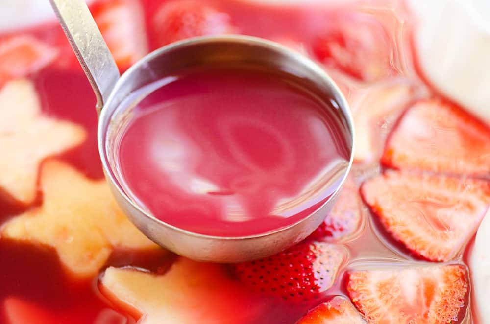 strawberry rhubarb punch in laddle