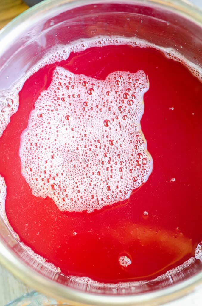 rhubarb juice in stainless steel bowl