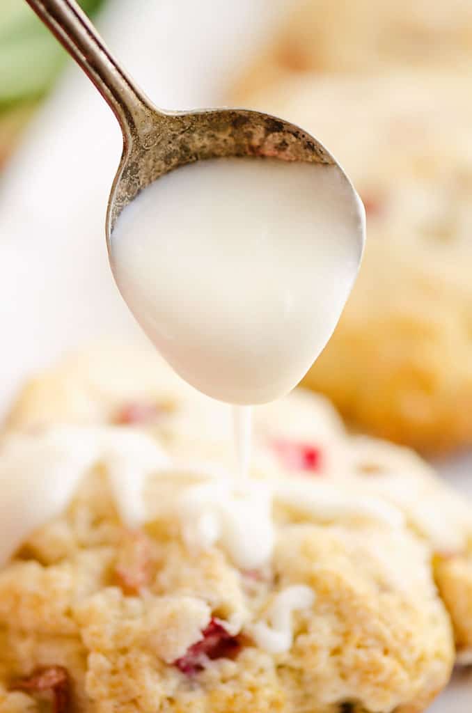 vanilla icing drizzled over rhubarb scone