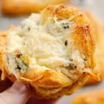 chicken broccoli crescent cups held in hand