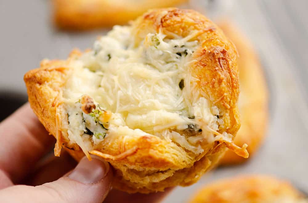 chicken broccoli crescent cups held in hand