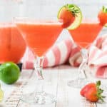 table with napkin, pitcher and frozen daiquiris