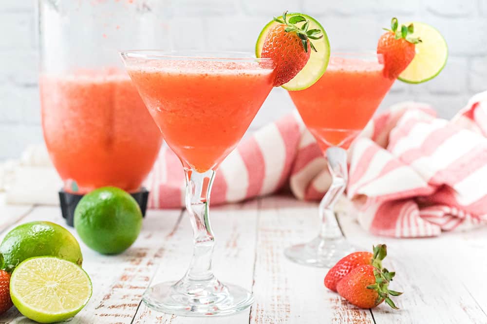 table with napkin, pitcher and frozen daiquiris