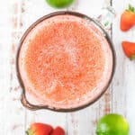 blender full of frozen strawberry daiquiris