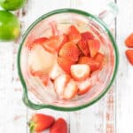 blender with strawberries and limeade