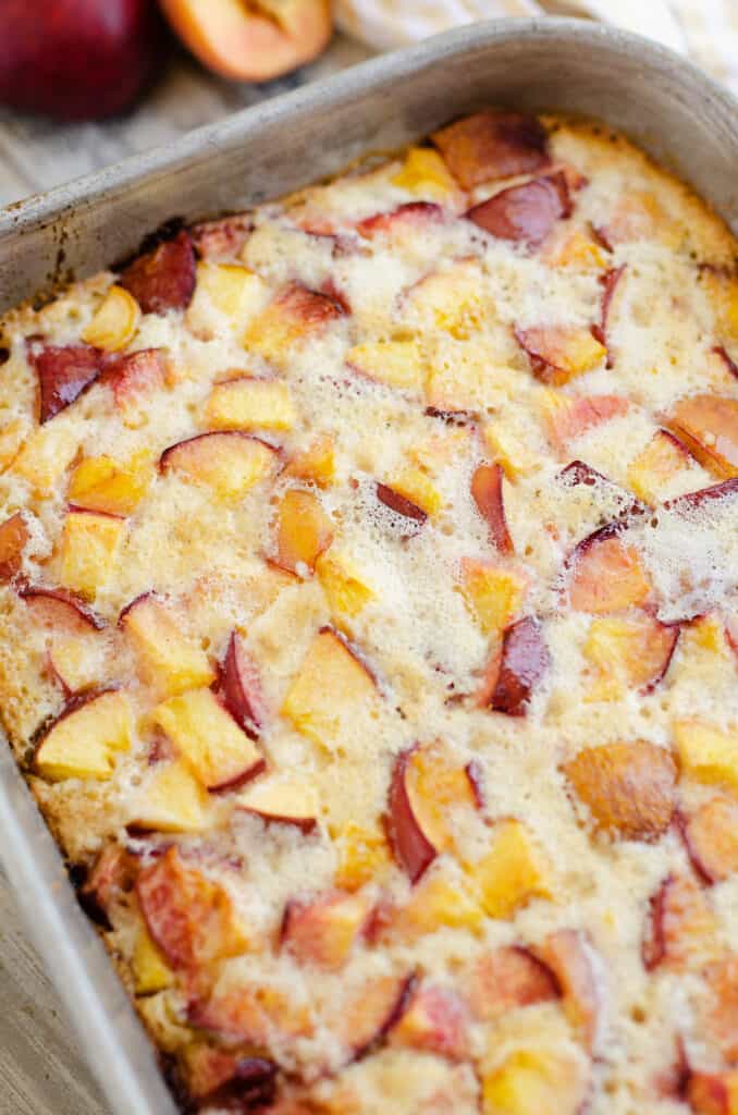 peach custard dessert in pan