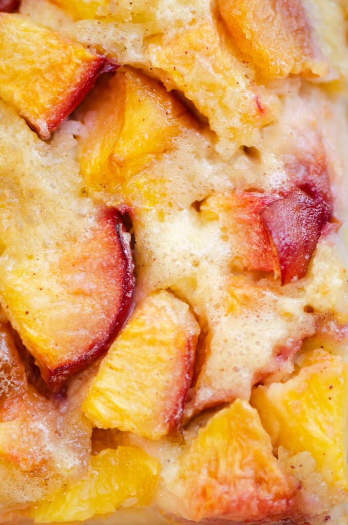 sliced peaches with skins in custard