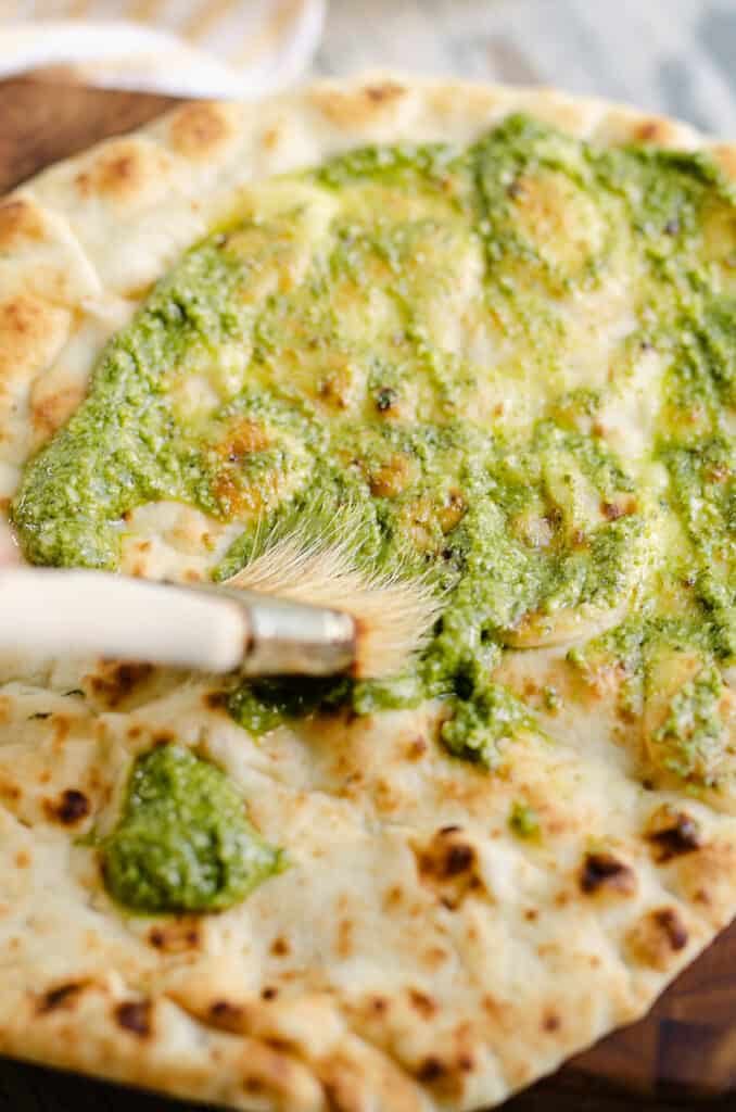 pesto brushed on flatbread naan