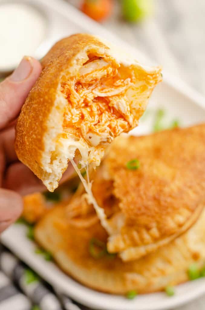 cheesy buffalo chicken calzone pulled apart