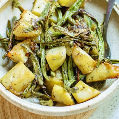 roasted green beans and potatoes on plate