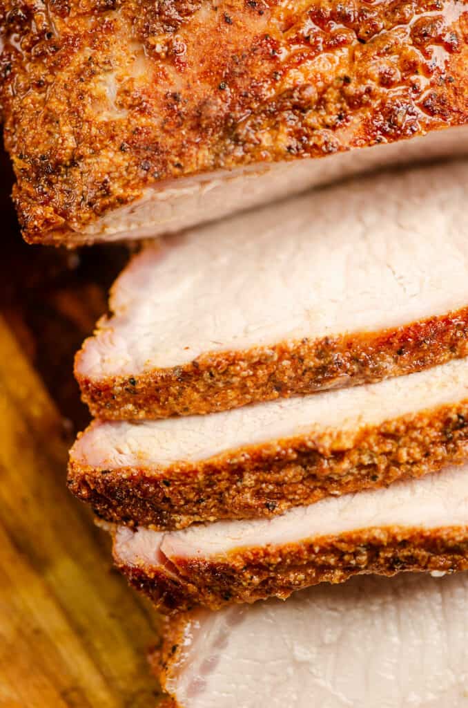 sliced of pork loin on cutting board