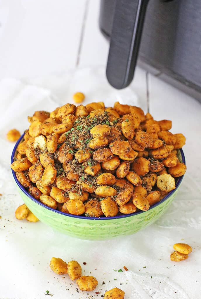 Taco Oyster Crackers in green bowl by Air Fryer