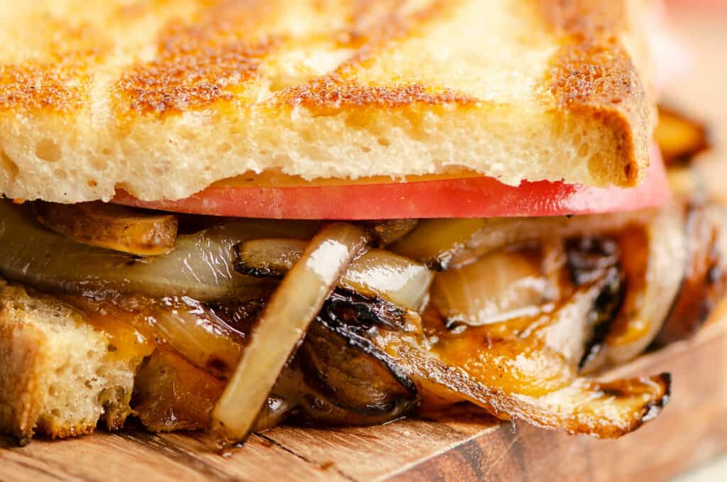 melted cheddar, balsamic onions and apples in grilled cheese sandwich