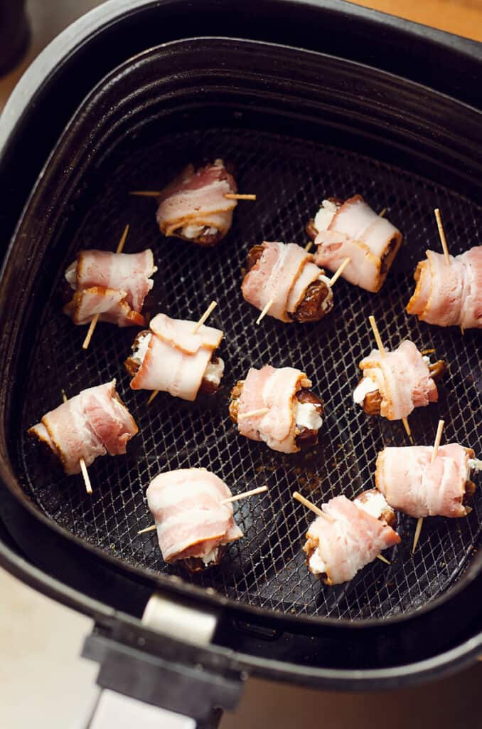 bacon wrapped goat cheese dates in Air Fryer basket