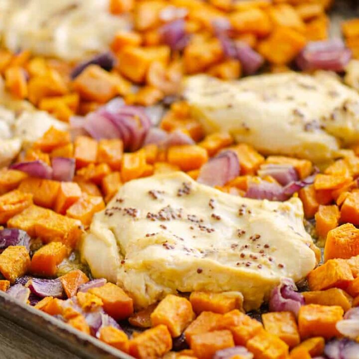 honey mustard chicken breast and sweet potatoes on sheet pan